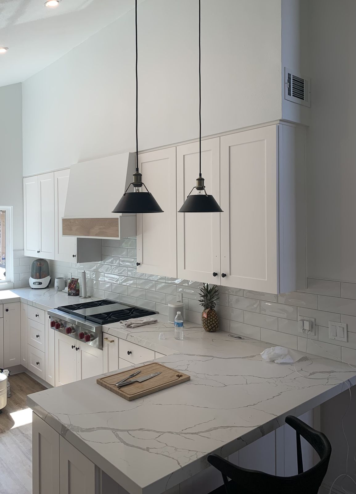 White Shaker Kitchen with Stone Island